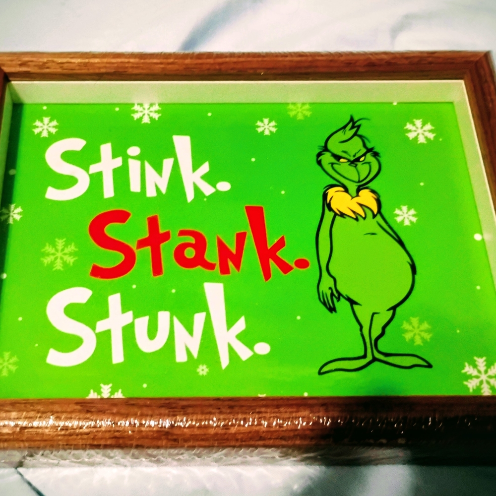 Source Unknown Green and Red Grinch Holiday Decor
